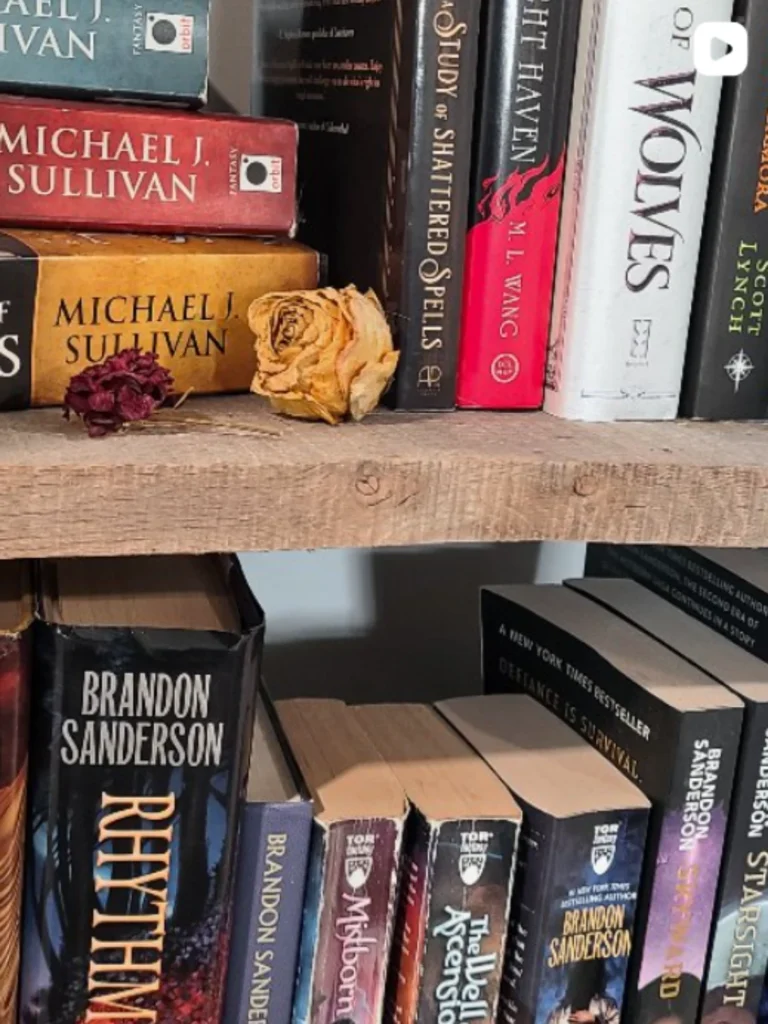 Bookcase a rustic bookshelf with dried roses nestled against the books